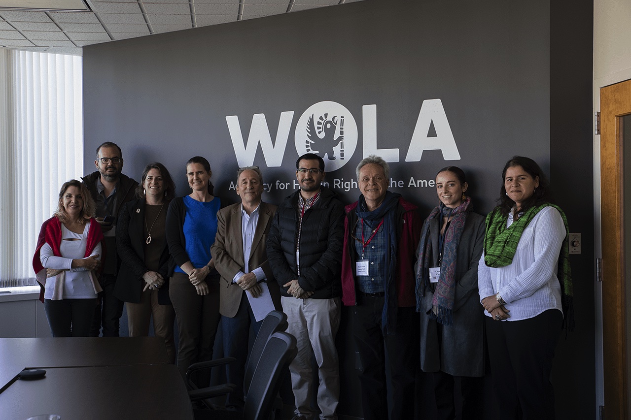 Vidas Sitiadas researchers meeting with personnel at WOLA.