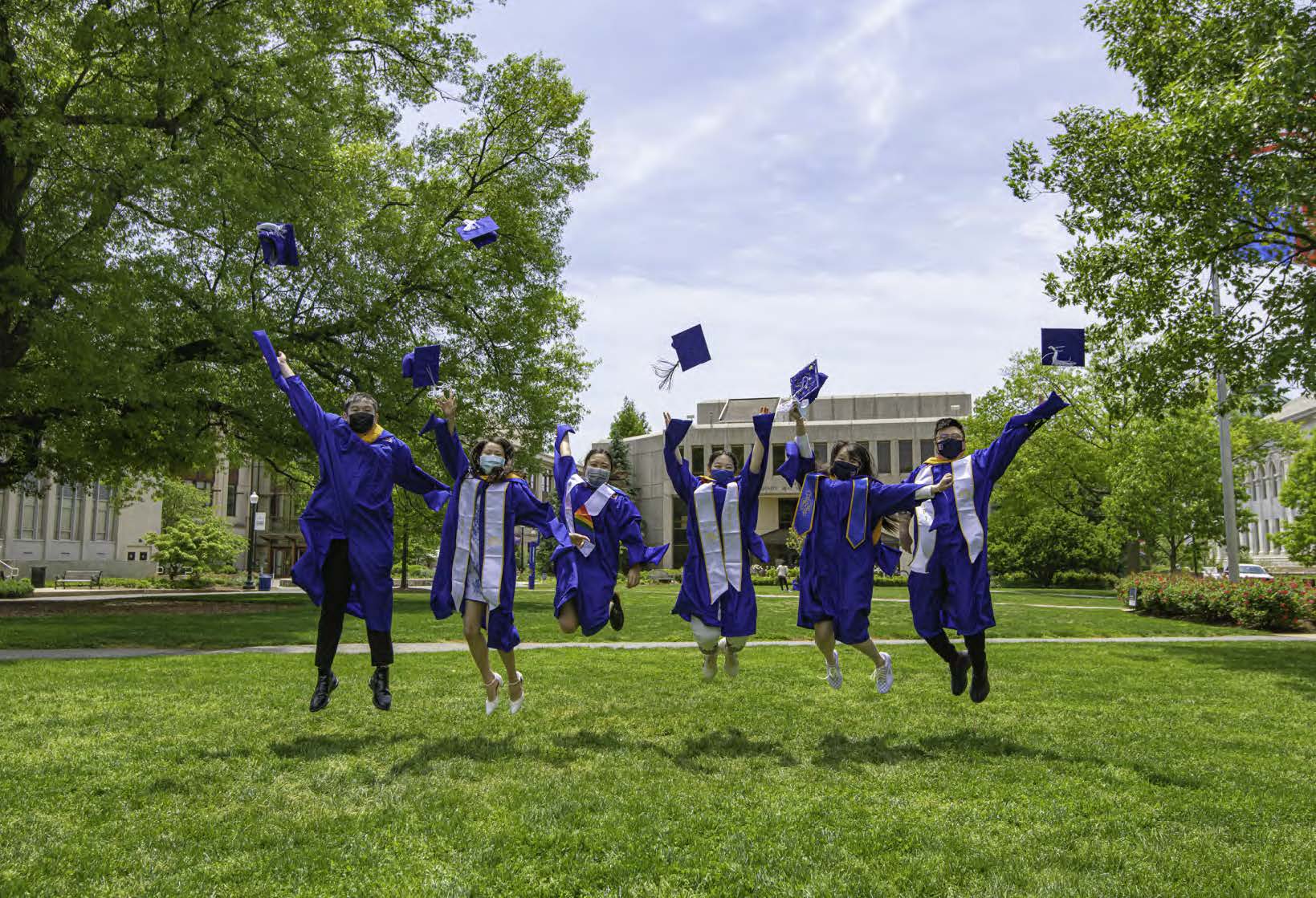 student's jumping after graduation
