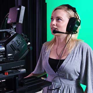 A student operates a camera in American University's state-of-the art Media Production Center.