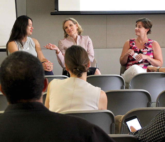 Cynthia Miller-Idriss engages with other faculty and staff at a panel discussion.