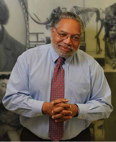 NMAAHC director Lonnie Bunch in front of a museum exhibit