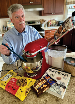 Ed Wasil in his kitchen with his baking supplies