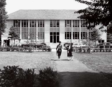From the archives: three students walking in front of the School of International Service building.