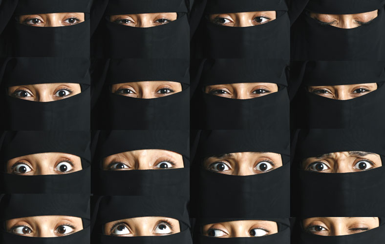 A collection of women in veils. Only their eyes are showing
