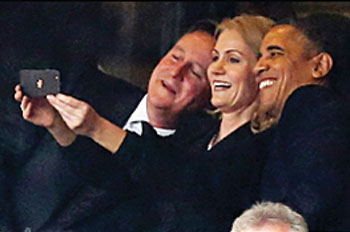 President Obama taking a selfie