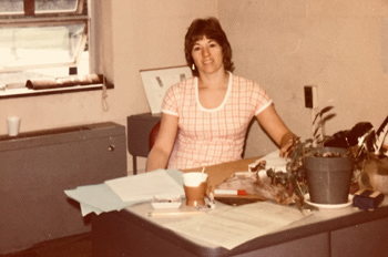 Roberta Rubenstein sits in her AU office in the early 1970s
