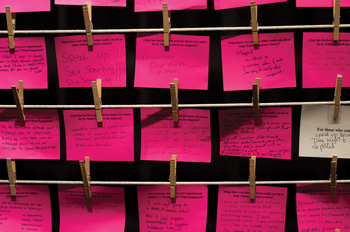 pink post-it notes from "El Tenedero/The Clothesline Project" by Monica Mayer