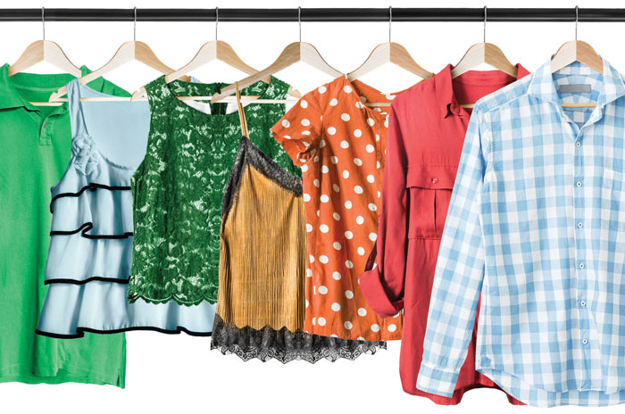 colorful tops hanging on a rack