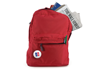 backpack with a Wall Street Journal peaking out