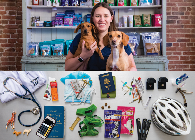 Above, Alyssa White holds her dogs, Linus and Rerun. Below, a lab coat and stethoscope; crackers; surgical equipment; a passport; needles and blood tubes; Patriot League championship rings; a canine toothbrush; animal figurines; Drug handbook; dog treats