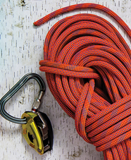 Climbing rope and belaying device