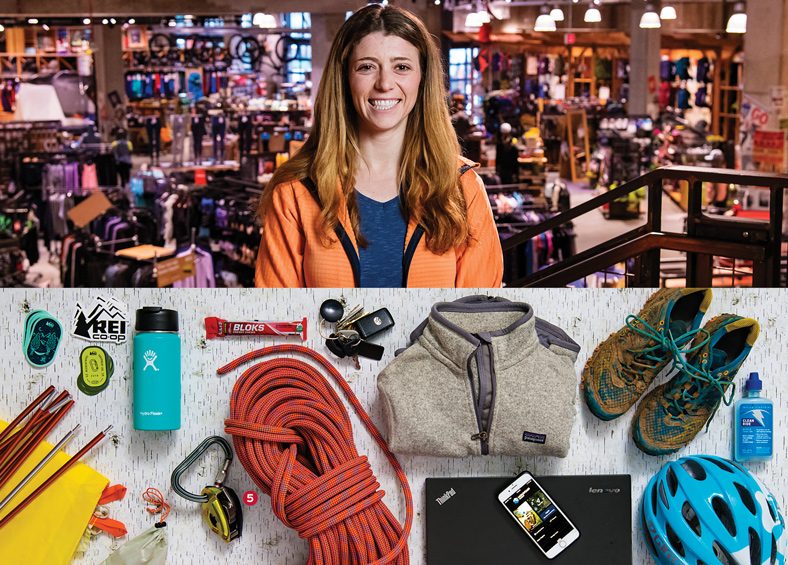 Stephanie Piperno, REI stickers, a tent, a coffee thermos, energy chews, a belaying device, climbing rope, car keys, a fleece jacket, a laptop, a smart phone, trail running shoes, bike lube, and a bike helmet