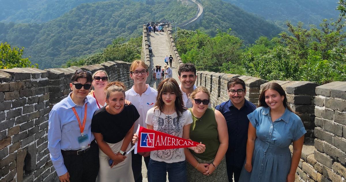 20260906_095854 2 Photo of the AU group at the Great Wall.