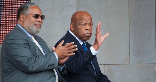 AU alumnus Lonnie Bunch, left, and Civil Rights icon and Georgia congressman John Lewis at the NMAAHC dedication ceremony. Photo by Leah L. Jones.