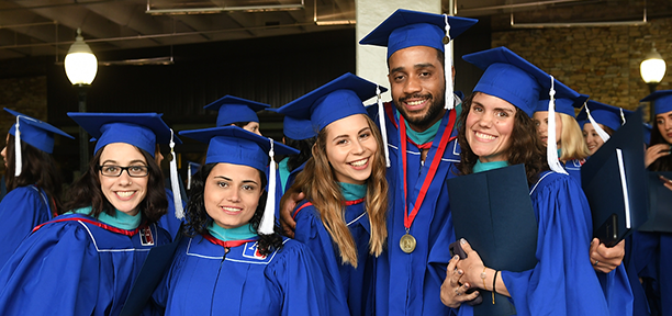 Members of the class of 2019 gather in the tunnel for commencement