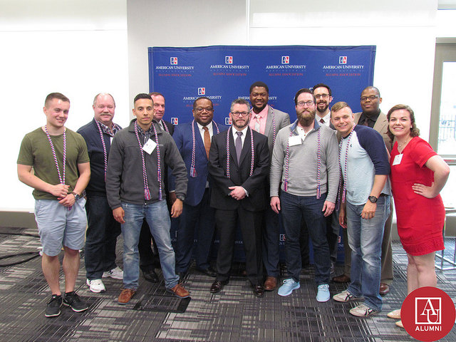 Participants in the 2018 Student-Veteran Graduation pose as a group