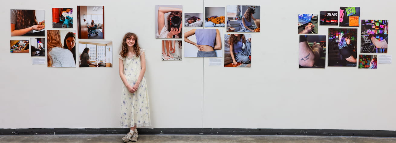 AU student exhbiting in photography in annual undergraduate exhibition.