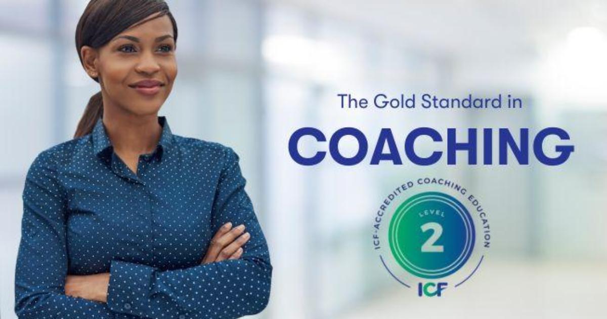 Woman standing with text next to her saying ICF Gold Standard Level 2