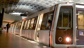 Metro station train stopping to board passengers