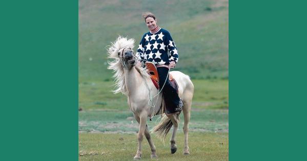 Ambassador Piper Campbell rides a crazy horse in Mongolia