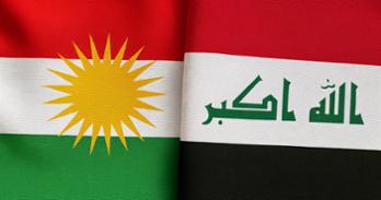 Image of flags of Kurdistan and Iraq.