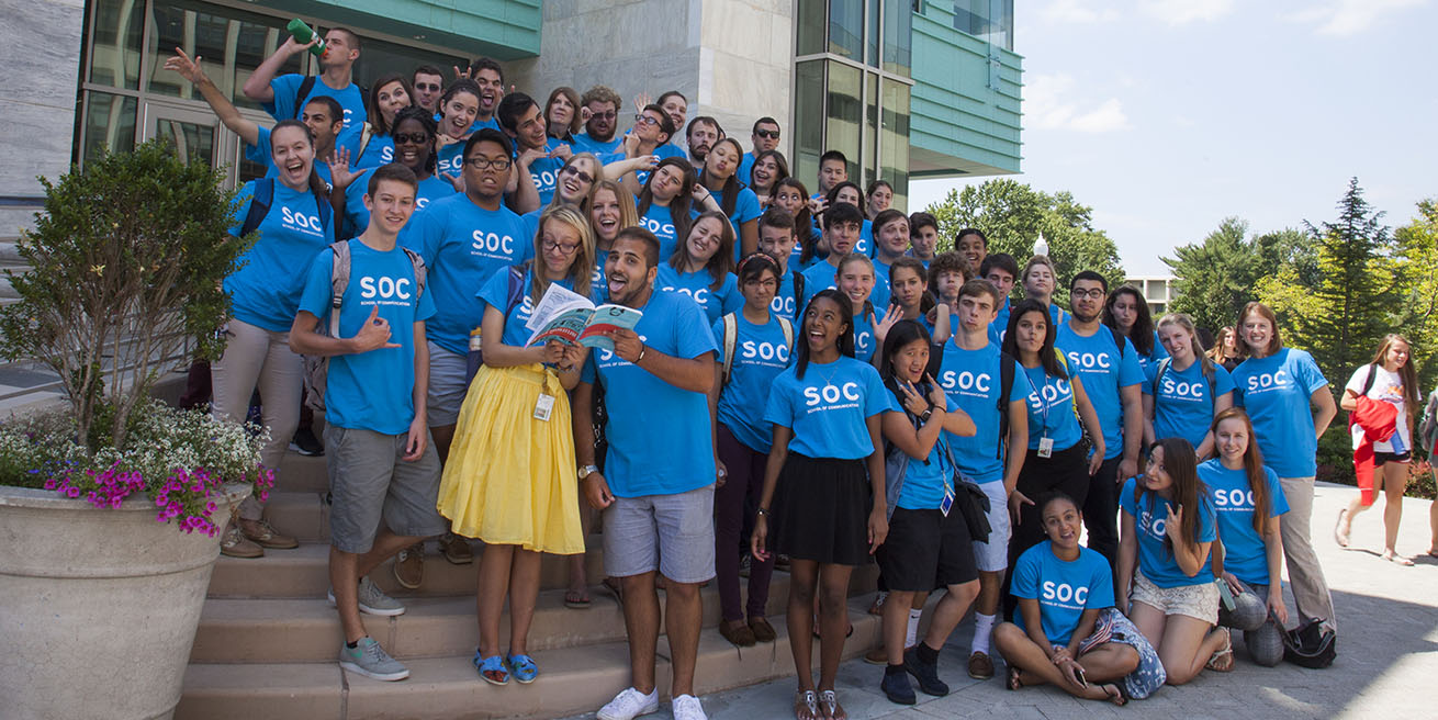 Large group of SOC Ambassadors pose outside the McKinley building.