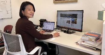 Jisun Jeong at her desk