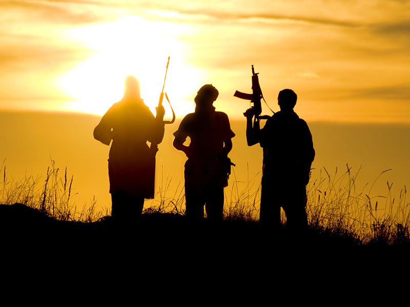 Silhouette of Three Foreign Fighters
