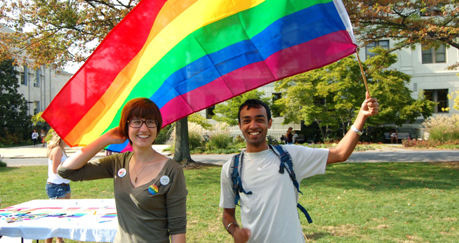 Two students with the Pride flag