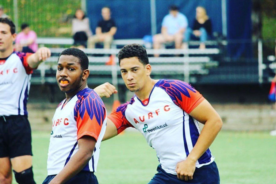Lawrence Holman with teammate during club rugby
