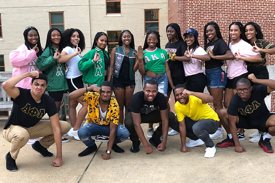 Lawrence with his Alpha Phi Alpha fraternity chapter mates and the Alpha Kappa Alpha Sorority chapter
