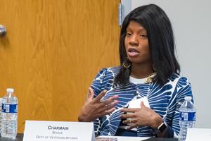 Woman talking at a panel