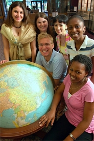 Students with world globe.