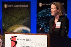 Suhay giving a talk at the National Academy of Sciences about her new research project focused on communicating science.