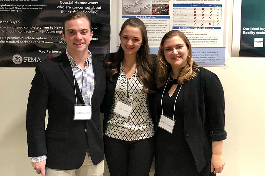 Matt Mullins, Irena Volkov, and Samantha Hepworth present their I-CORPS projects at the Mathias Student Research Conference.