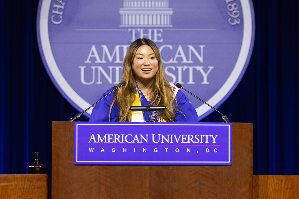 Student speaker Angela Chen addresses the crowd at the 2025 AUWCL Commencement Student speaker Angela Chen addresses the crowd at the 2025 AUWCL Commencement