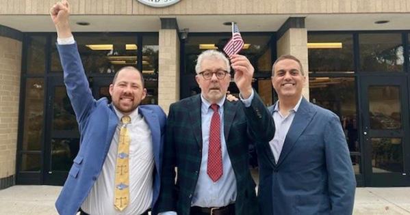 Ryan Durazo '21 (left), Henry Pachnowski (center), and Professor Jayesh Rathod (right) after Pachnowski passed his citizenship test.