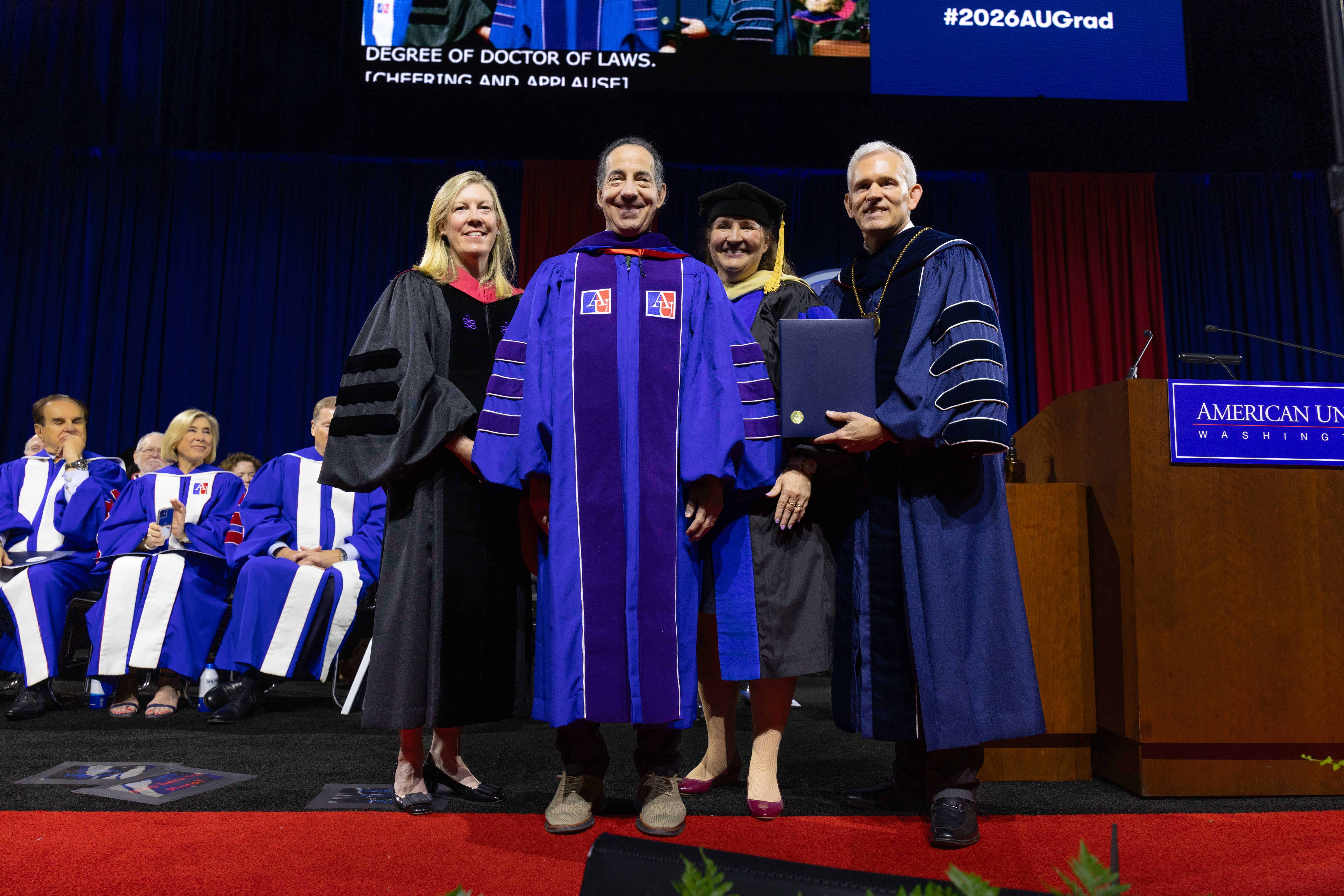 Jamie Raskin getting robed after receiving his honorary degree. Jamie Raskin getting robed after receiving his honorary degree.